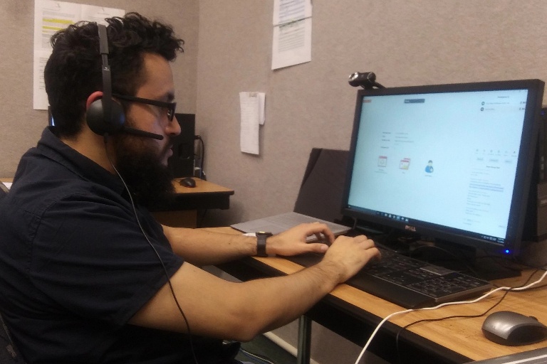 A student mentor works with a program participant virtually. Photo courtesy of Student Success Corps