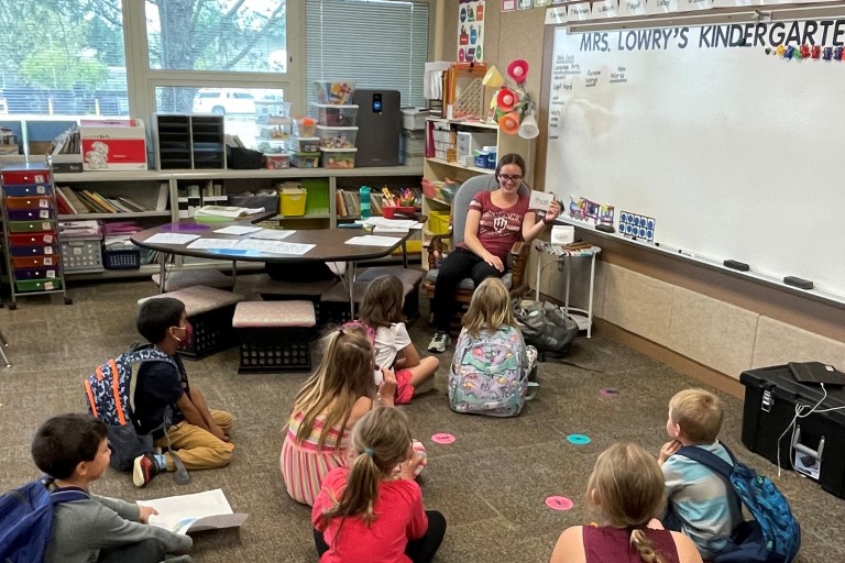 An IU student, Skeylar Lattimore, teaches a class of kindergarteners for her student teaching experience